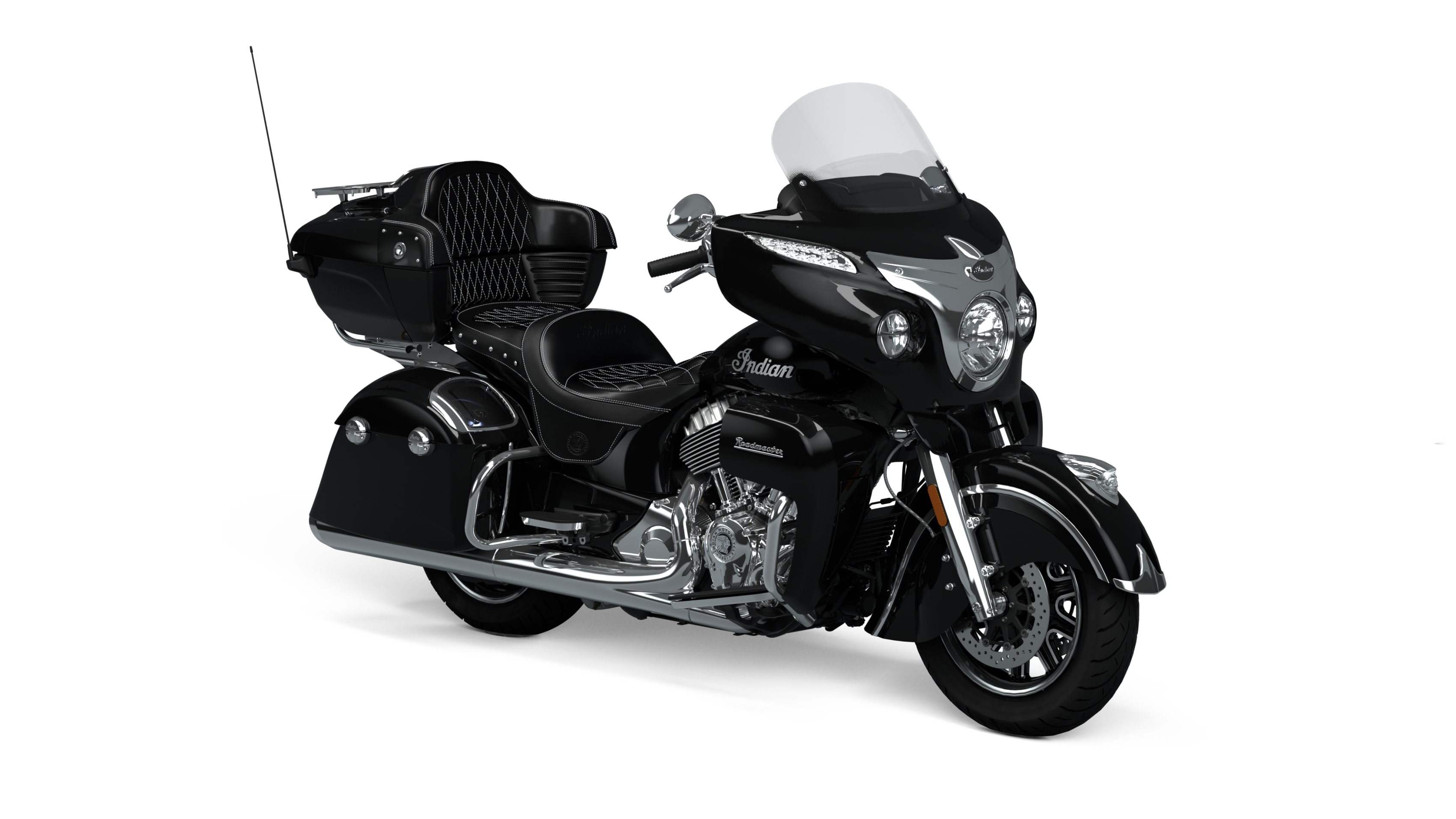 Indian Roadmaster motorcycle in black against a white background, showcasing its luxurious design and touring build.