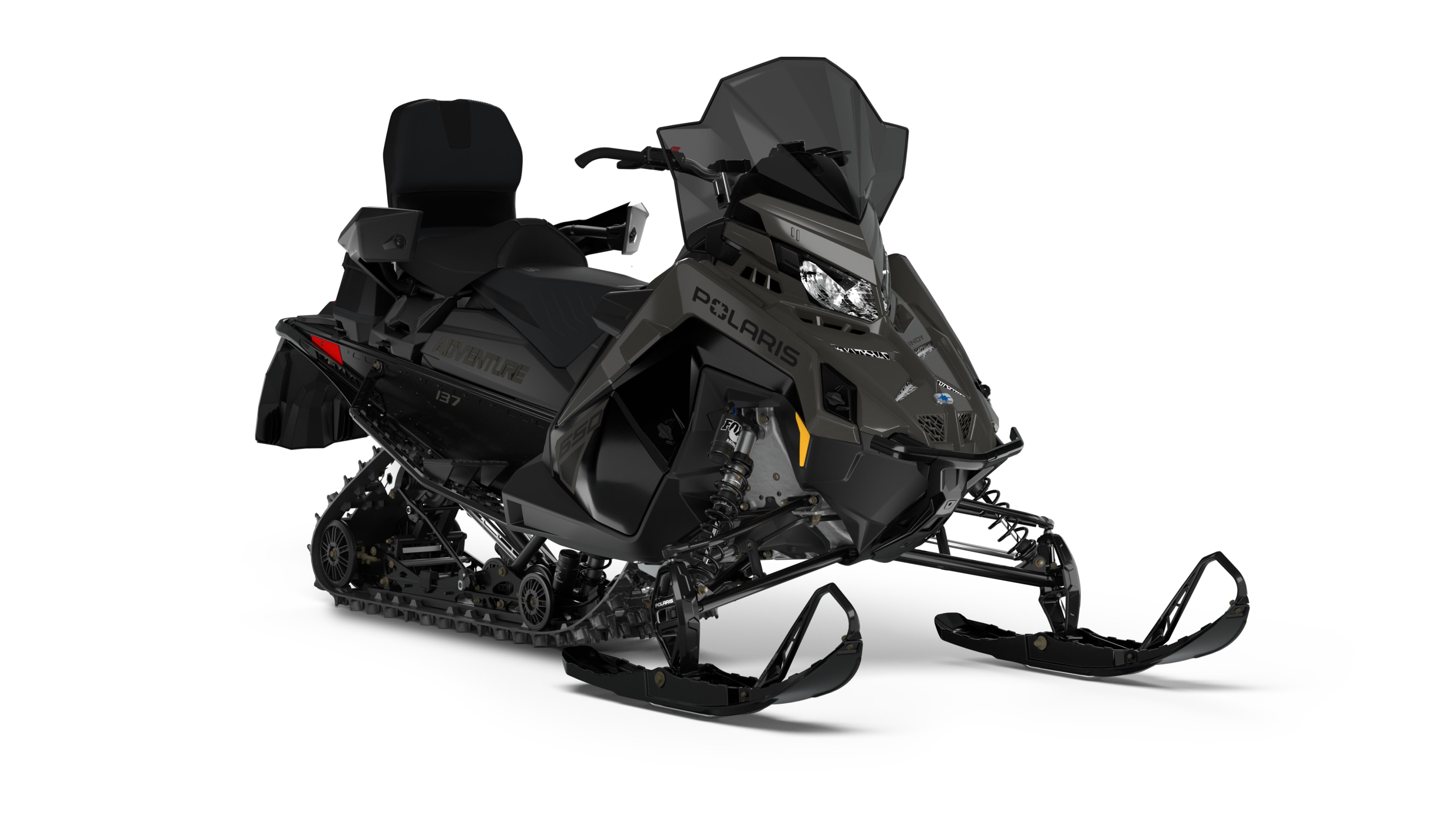 Polaris Indy Adventure snowmobile in a studio setting, ready for thrilling family winter escapades.