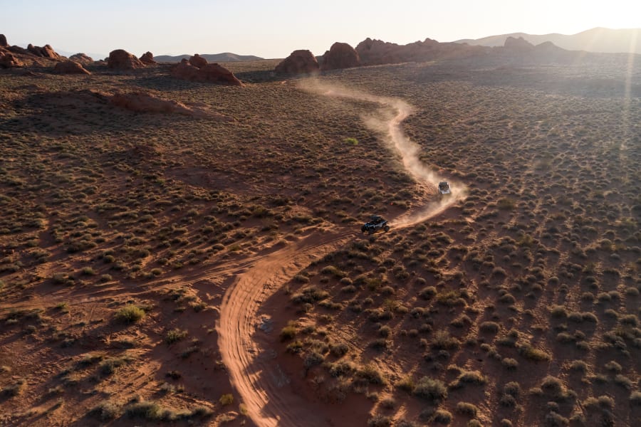 Two Polaris SUVs in Vegas desert