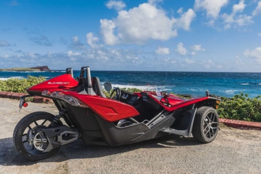 Red Polaris Slingshot by  Waikiki coast