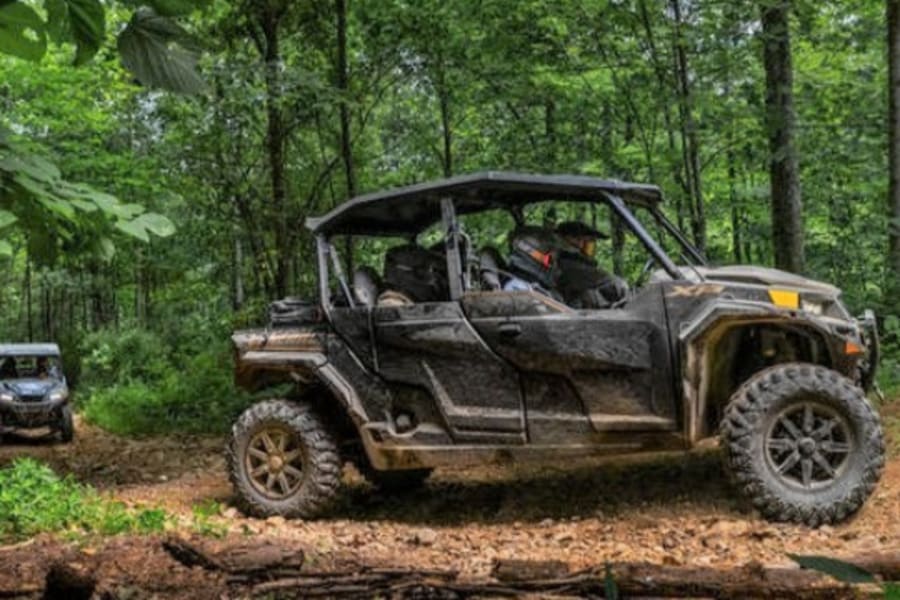 Groups of riders driving Polaris Generals in Wisconsin