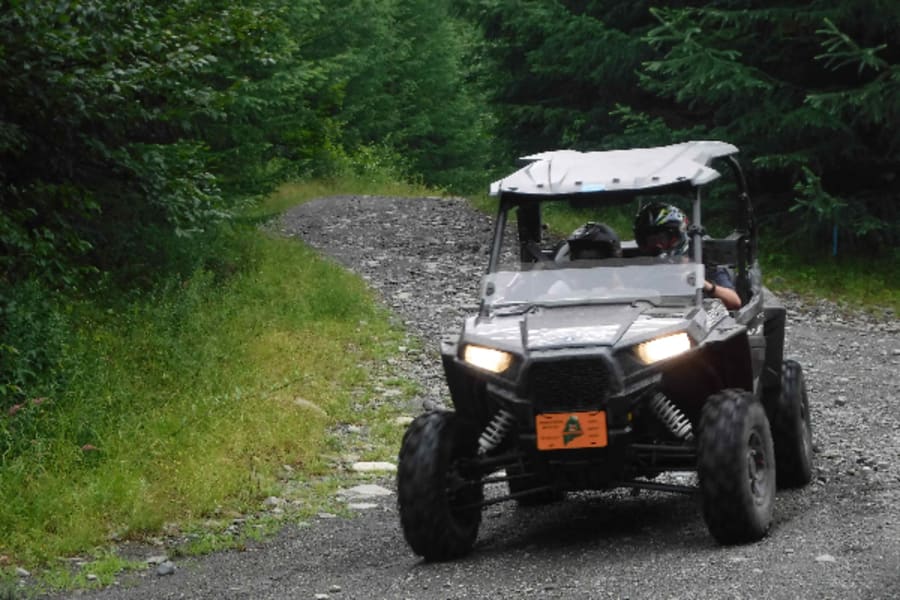 Polaris UTV on trail near Jackman, Maine