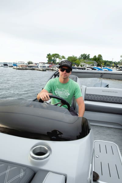 Man driving pontoon
