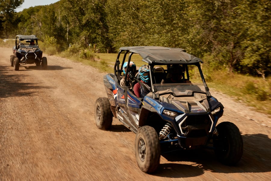 off-road vehicle riding on dirt trails