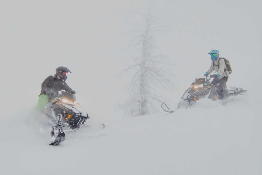 Snowmobiling fun with friends in Wyoming