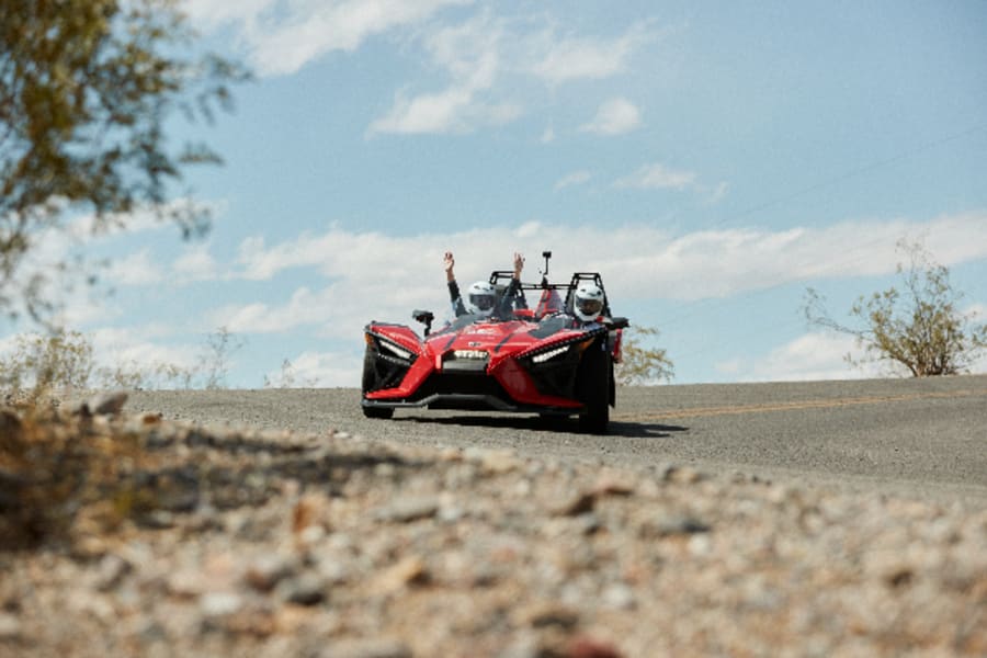 Two people in red Slingshot