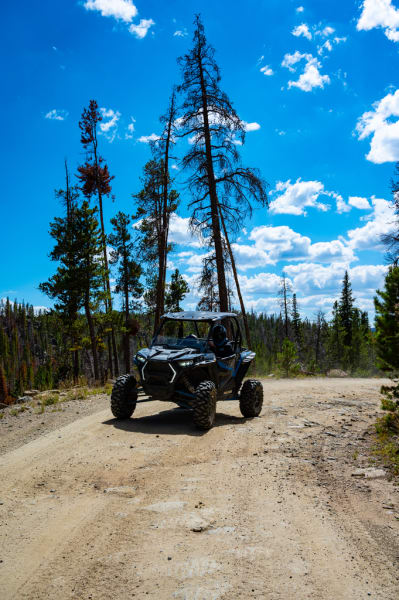 Polaris side by side on dirt trail in Wyoming