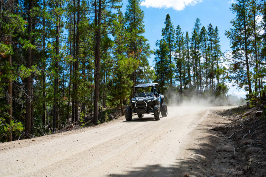 off-road vehicle driving on dirt trails