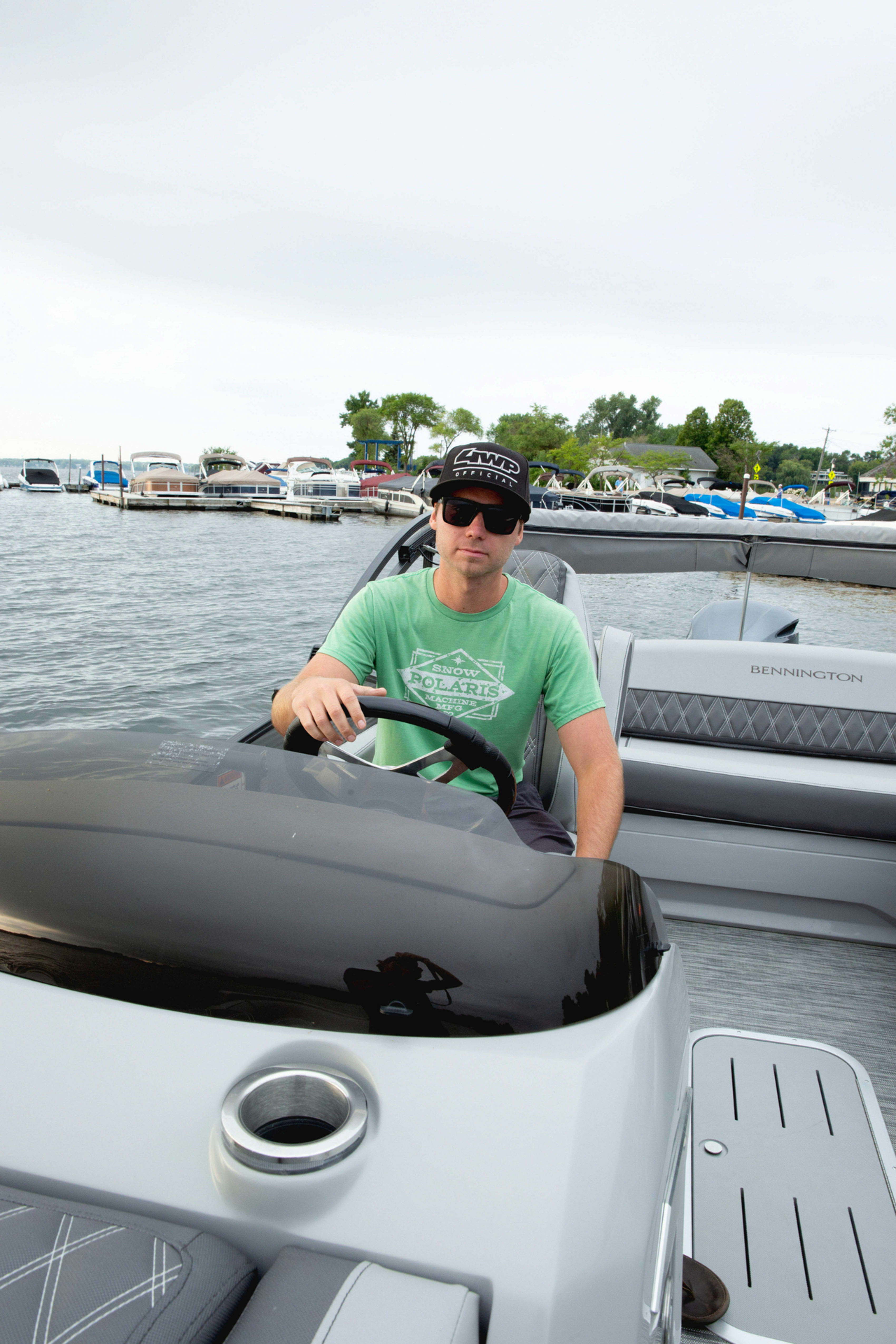 Man driving pontoon