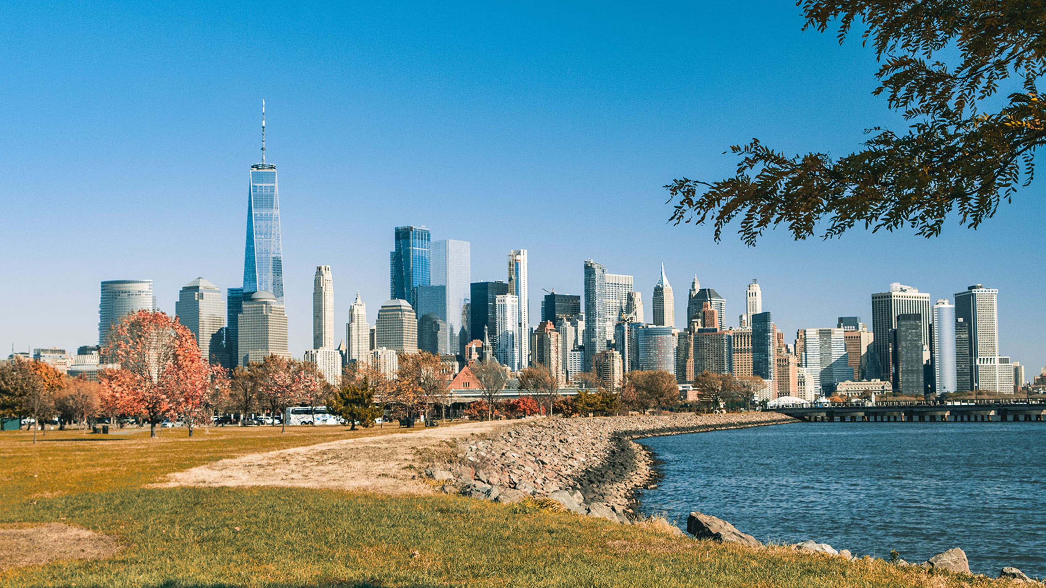 city skyline of New York along a body of water