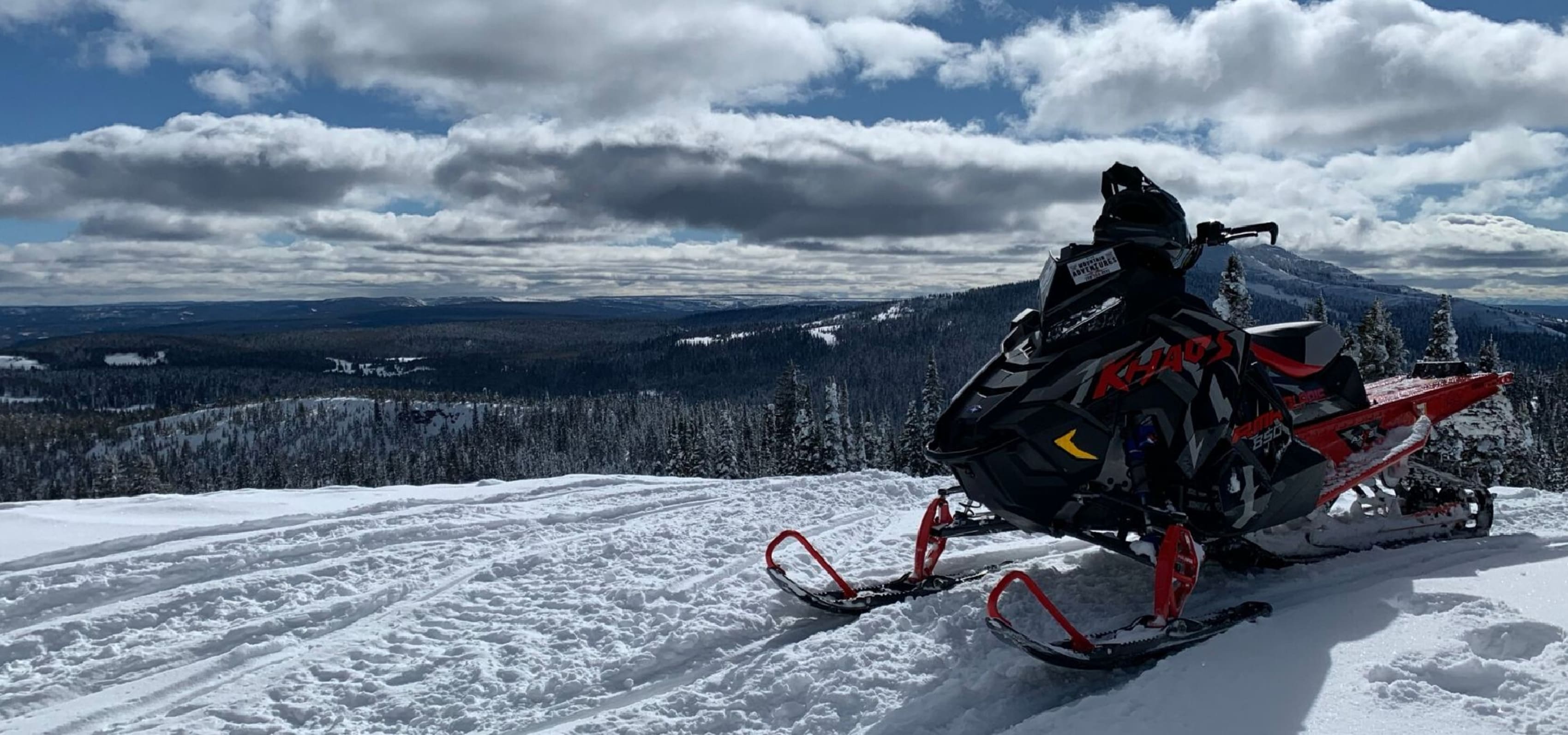 Red Polaris snowmobile